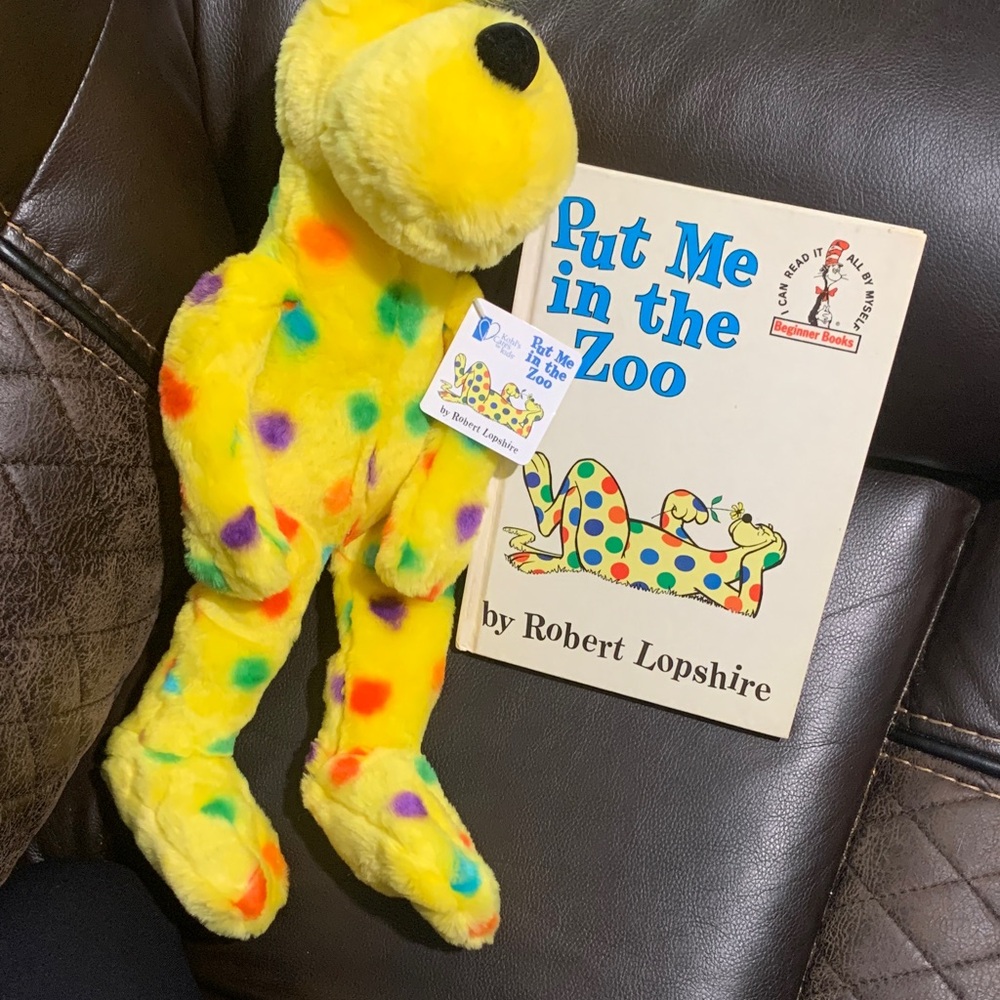 Put me in the zoo book by Dr Seuss and plush